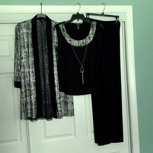 Navy 3 piece pant suit. Worn one time for wedding.